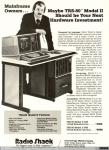 909 - Radio Shack. TRS-80 Model II, 1979