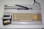 060 y 446 - Thomson TO7 con lápiz óptico y Cartucho de Microsoft BASIC, 1982