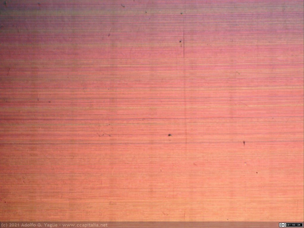 1490 - Microfotografía de nanosurcos capacitivos de un videodisco CED (2), 1981